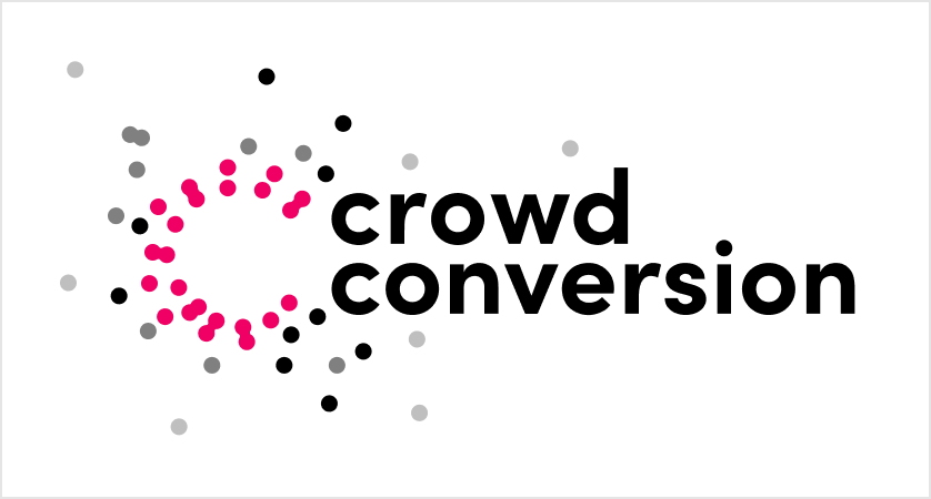 The logo at full size: pink dots form the C, with black and grey dots scattered around it